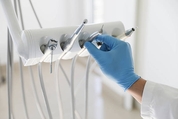 Professional Tooth Extraction technician working in Los Alamitos, CA